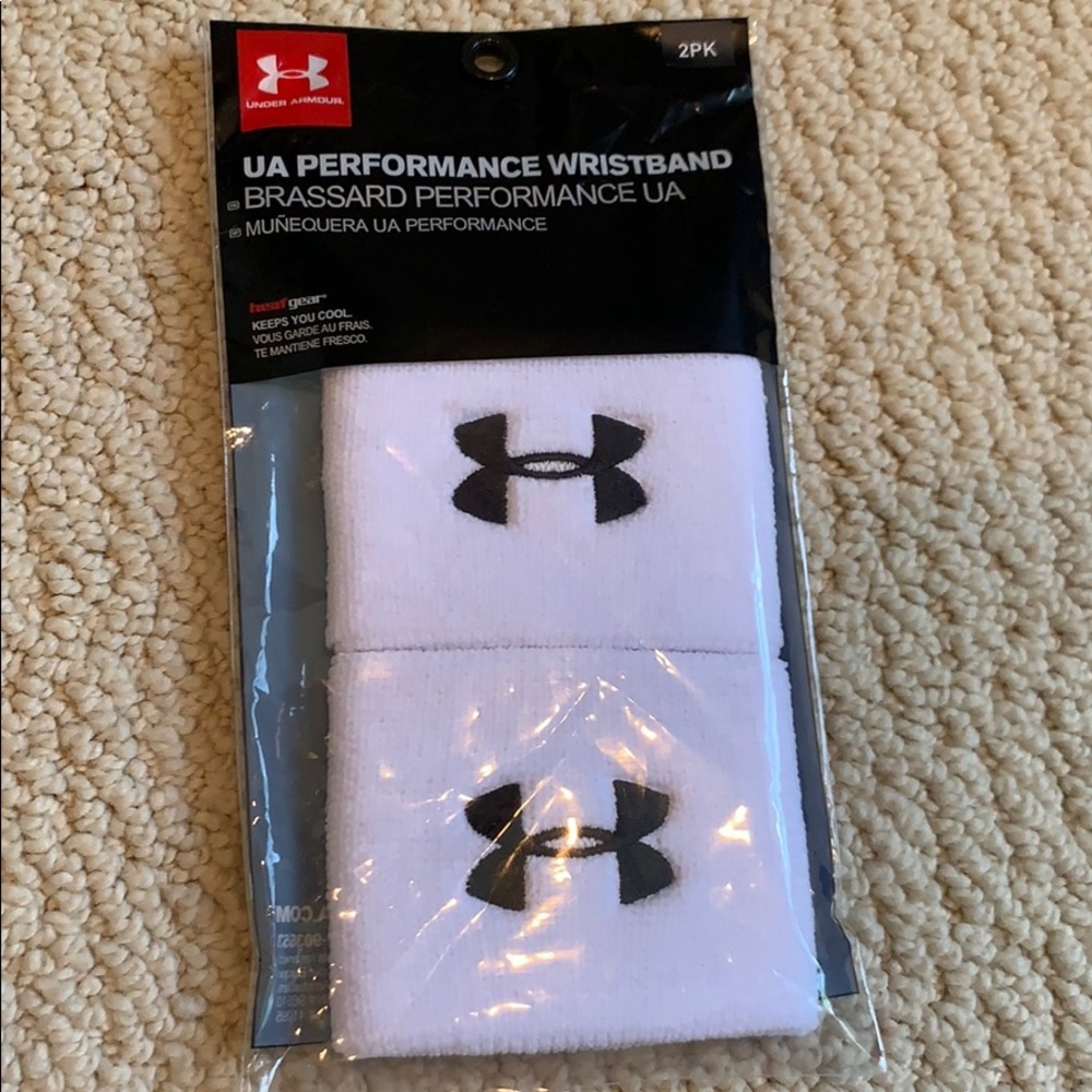 2 packs of Under Armour performance wristbands (2 per pack - 4 bands total)